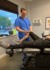 Shockwave Therapy in Frisco TX: Benefits, Cost & What It Treats Shockwave therapy device at Frisco Spinal Rehab delivering acoustic waves to stimulate healing, reduce pain, break up scar tissue, and support recovery from musculoskeletal injuries.