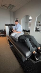 Chiropractor treating cervical disc herniation in Frisco TX